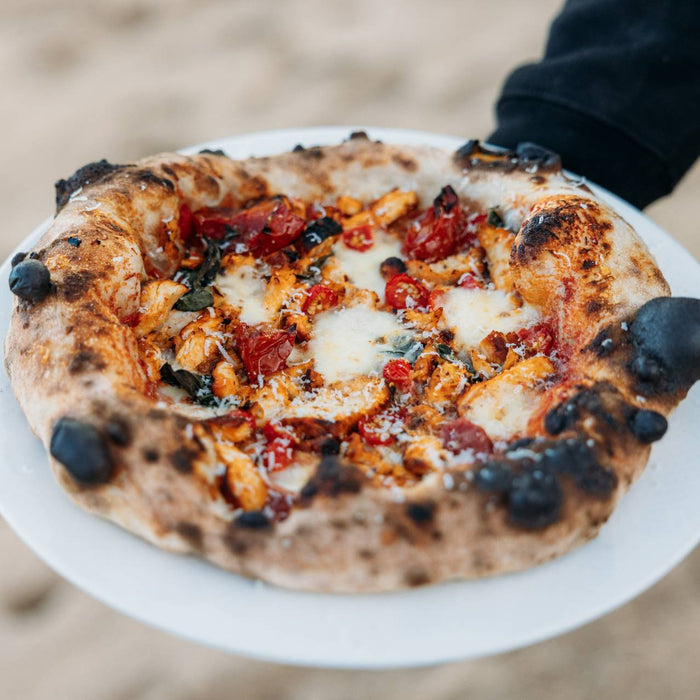 Pizza épicée au poulet rôti et à la harissa