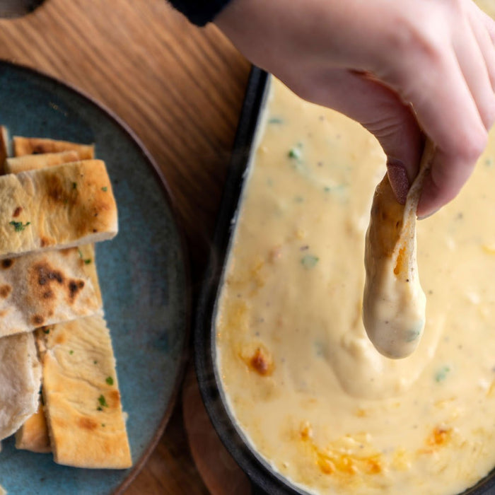 Fondue de fromage aux herbes cuites au four